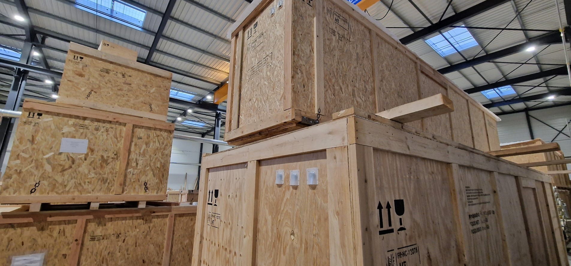Emballage 4C: Une synergie écologique entre bois NIMP15 et housse thermosoudable